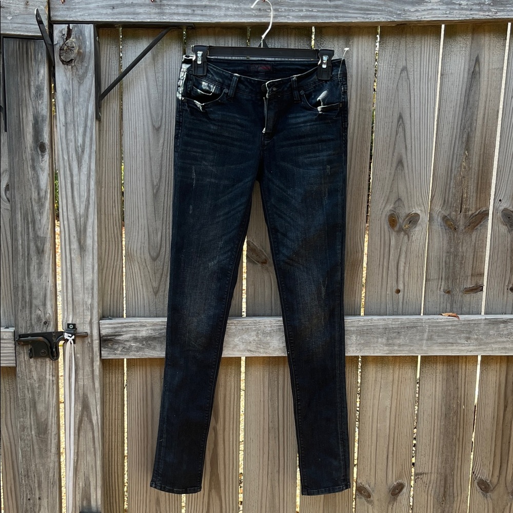 Women's Comune Dark slightly distressed jeans